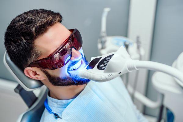 white hills man getting his teeth whitened