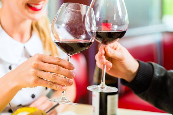 two people drinking red wine | teeth whitening white hills vic