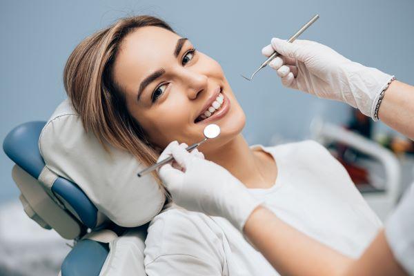 white hills woman smiling in dental chair