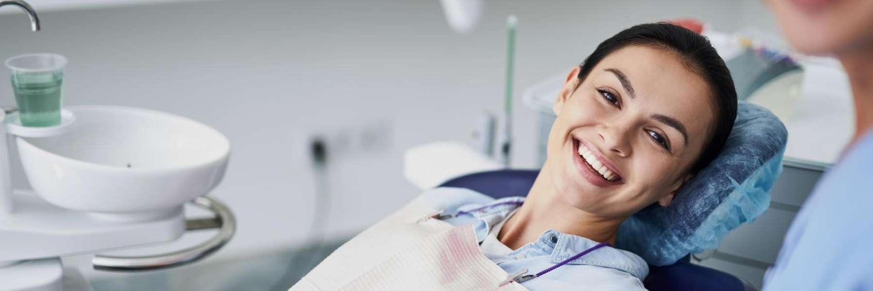white hills woman smiling in dental chair