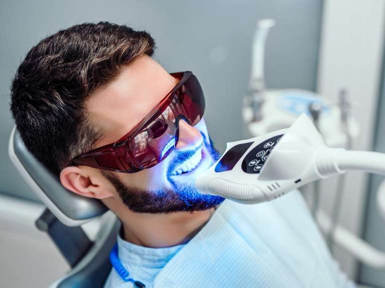 white hills patient getting teeth whitening | teeth whitening white hills vic